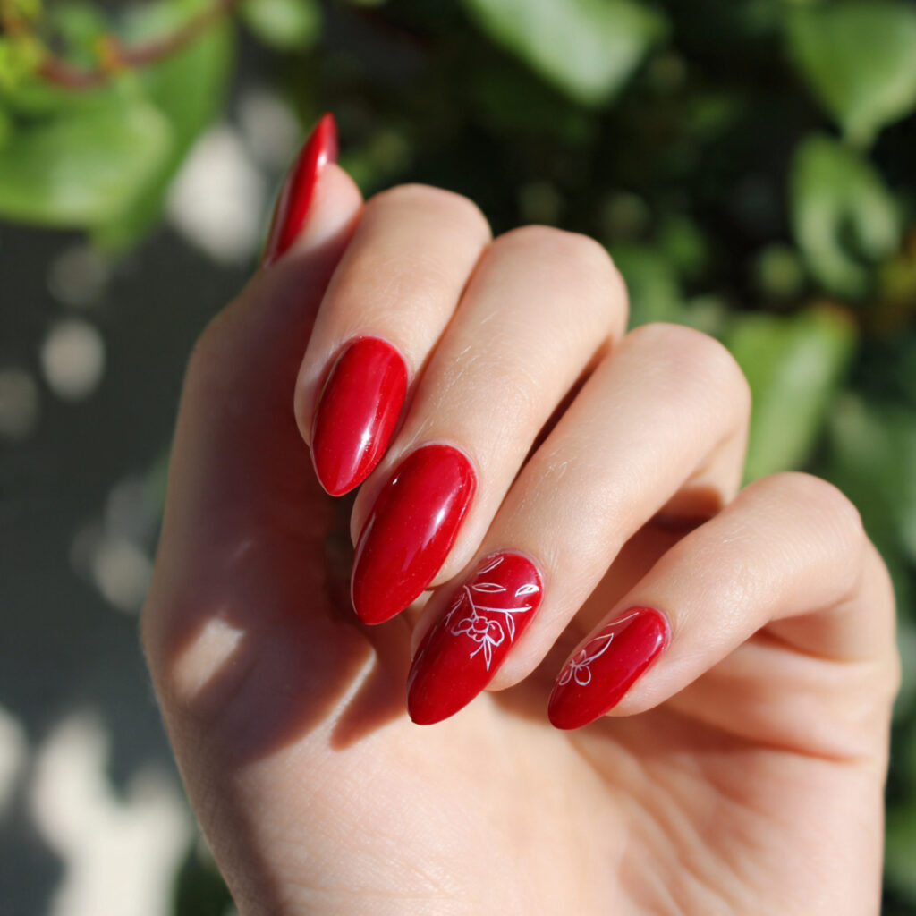 cherry red gloss with minimal line art nails