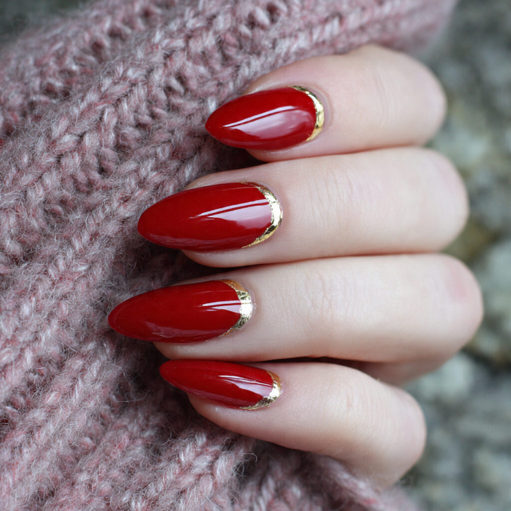 red almond with gold cuticle detail nails