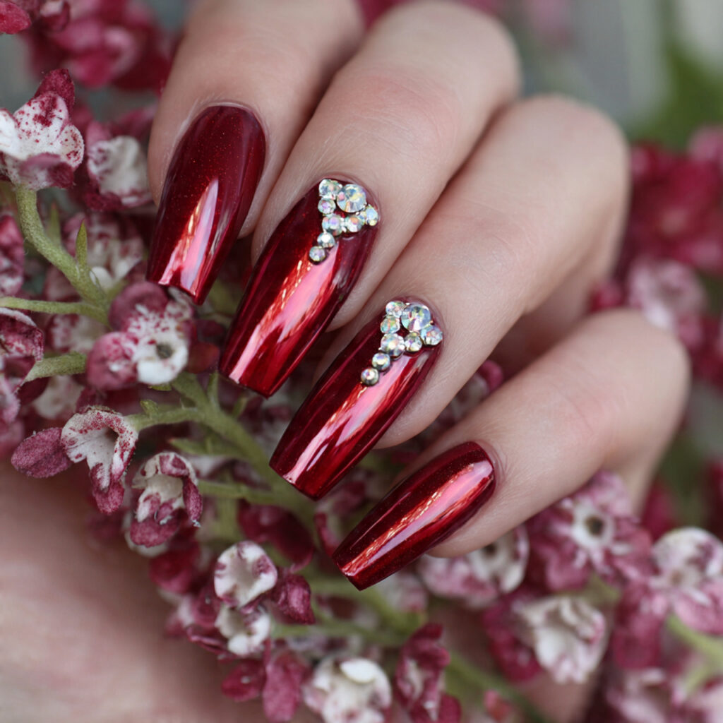 scarlet chrome with rhinestone accent nails