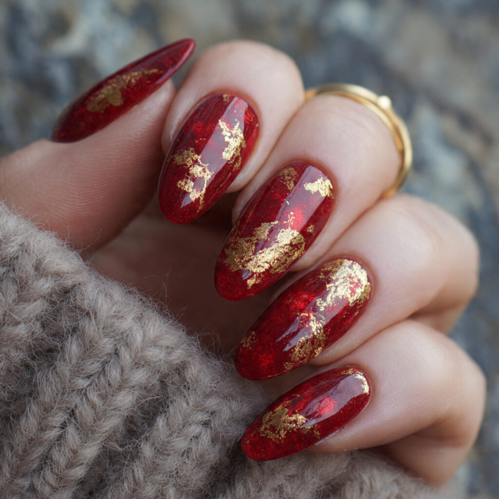 velvet red with gold leaf accents nails