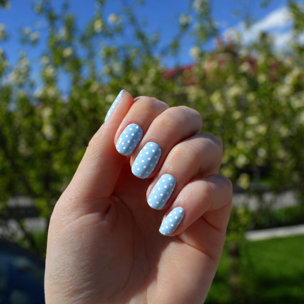 attractive baby blue dot nails with outdoor summer