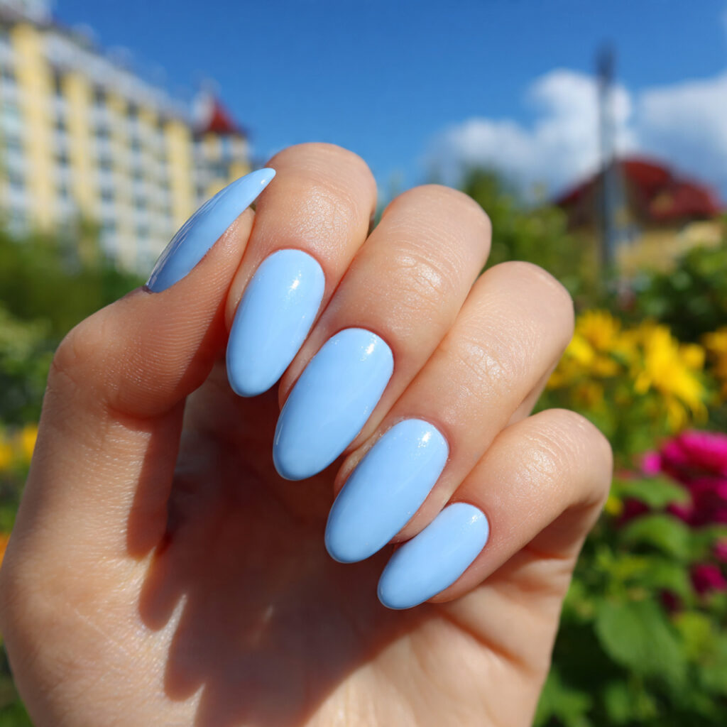 attractive baby blue glossy short oval nails with