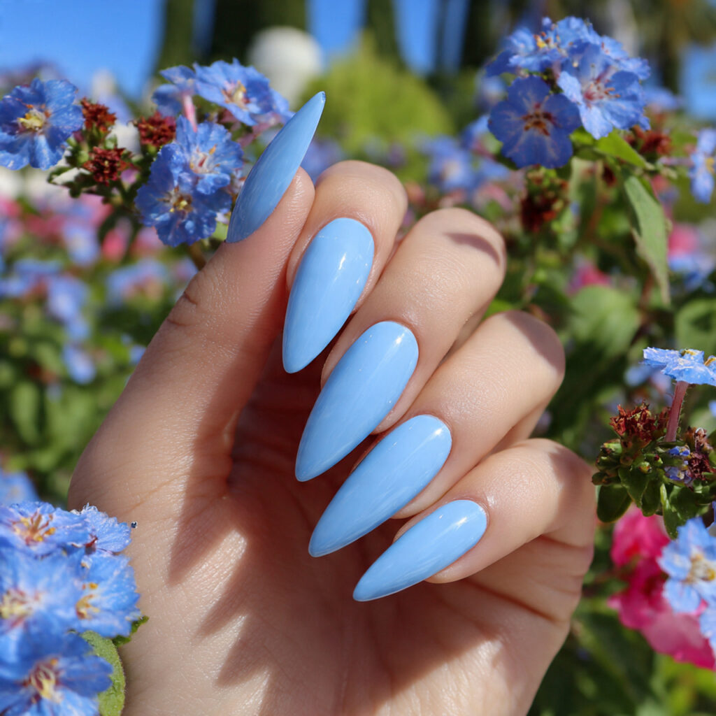 attractive baby blue glossy stiletto nails with su