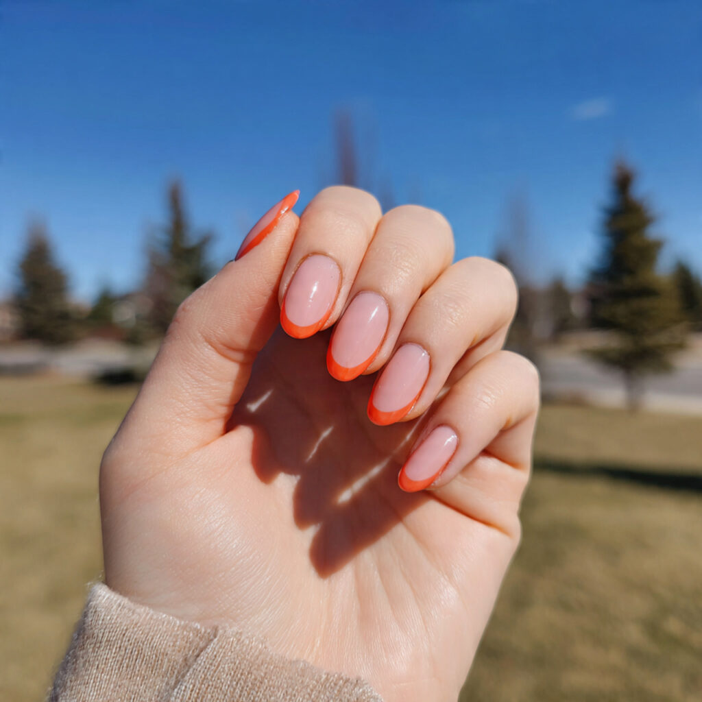 attractive baby pink and creamy orange nails with