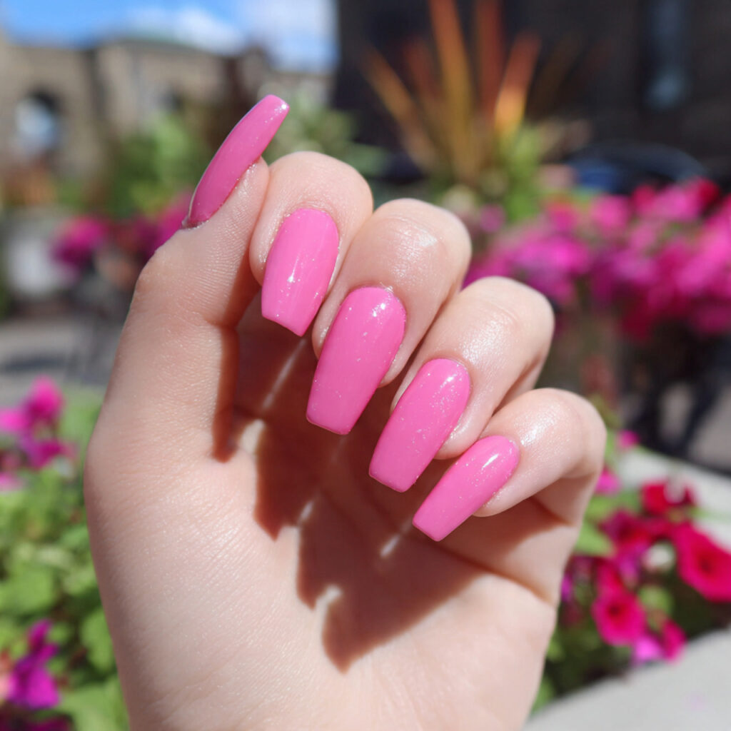 Nail Inspo Pink: 14 Dreamy Pink Nail Ideas You’ll Want to Save Immediately 12 attractive barbie pink coffin nails with outdoor b