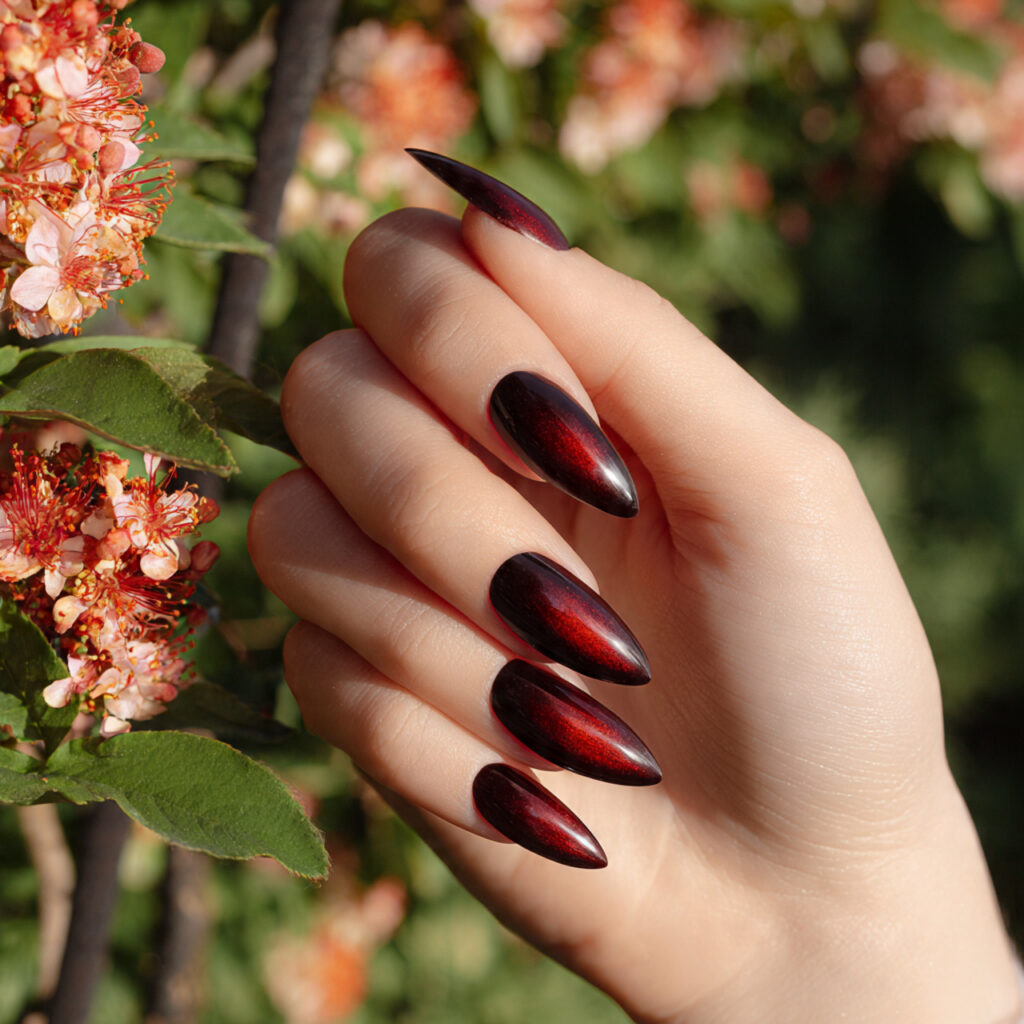 attractive black cherry cat eye stiletto nails wit 1