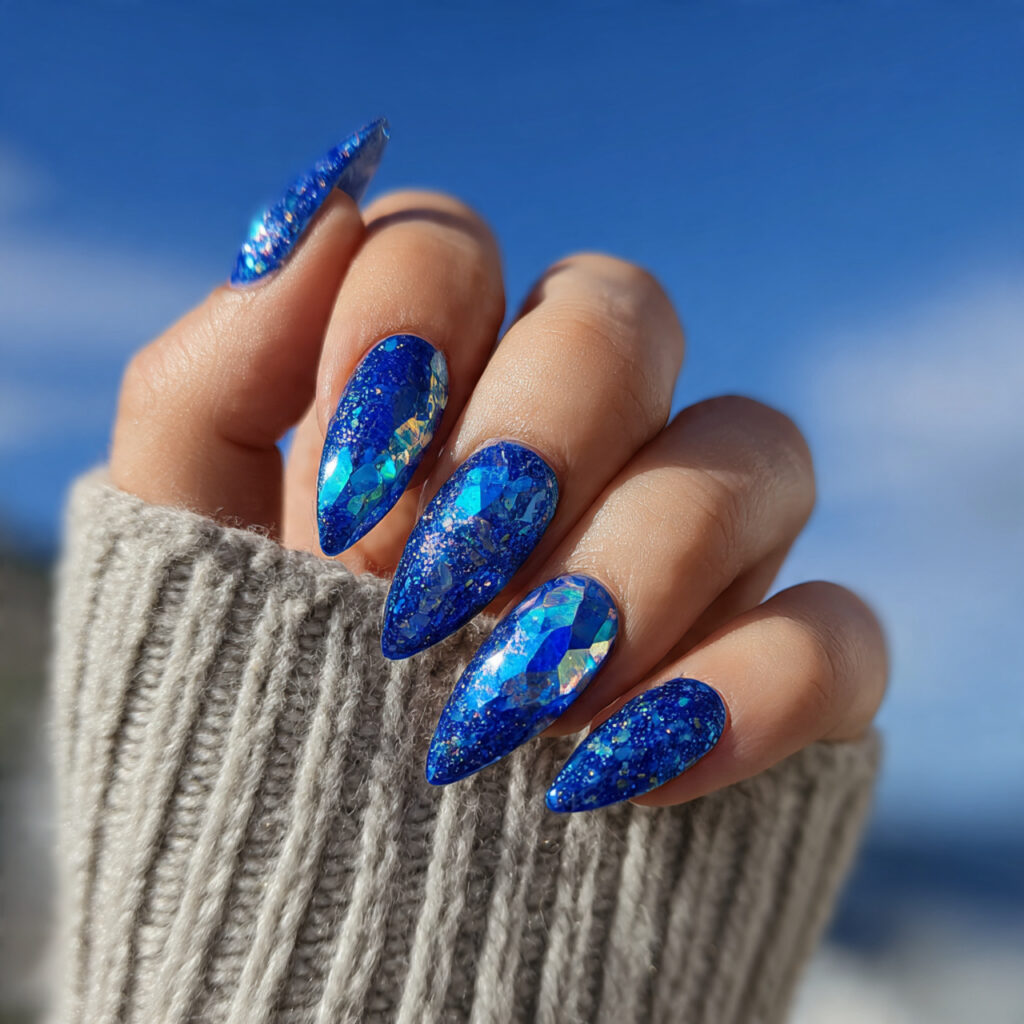 attractive blue aura nails with outdoor background