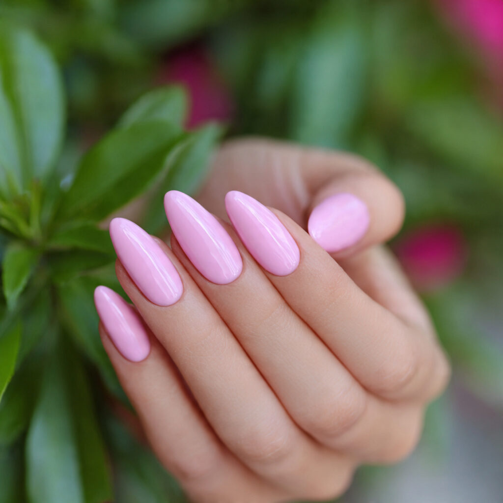 attractive bubblegum pink almond nails with outdoo