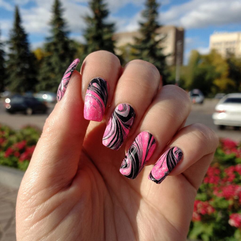 attractive bubblegum pink and black swirl nails wi