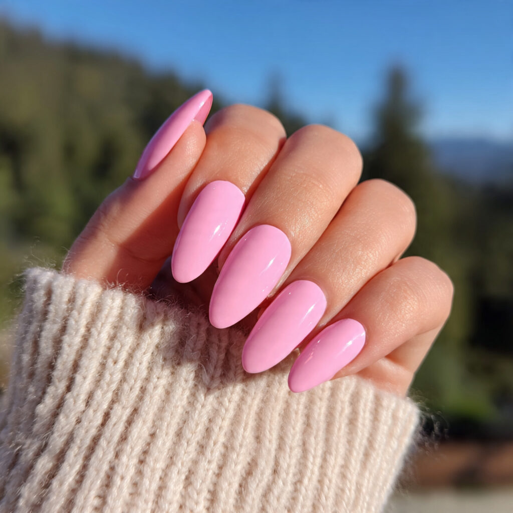 attractive bubblegum pink nails with outdoor backg