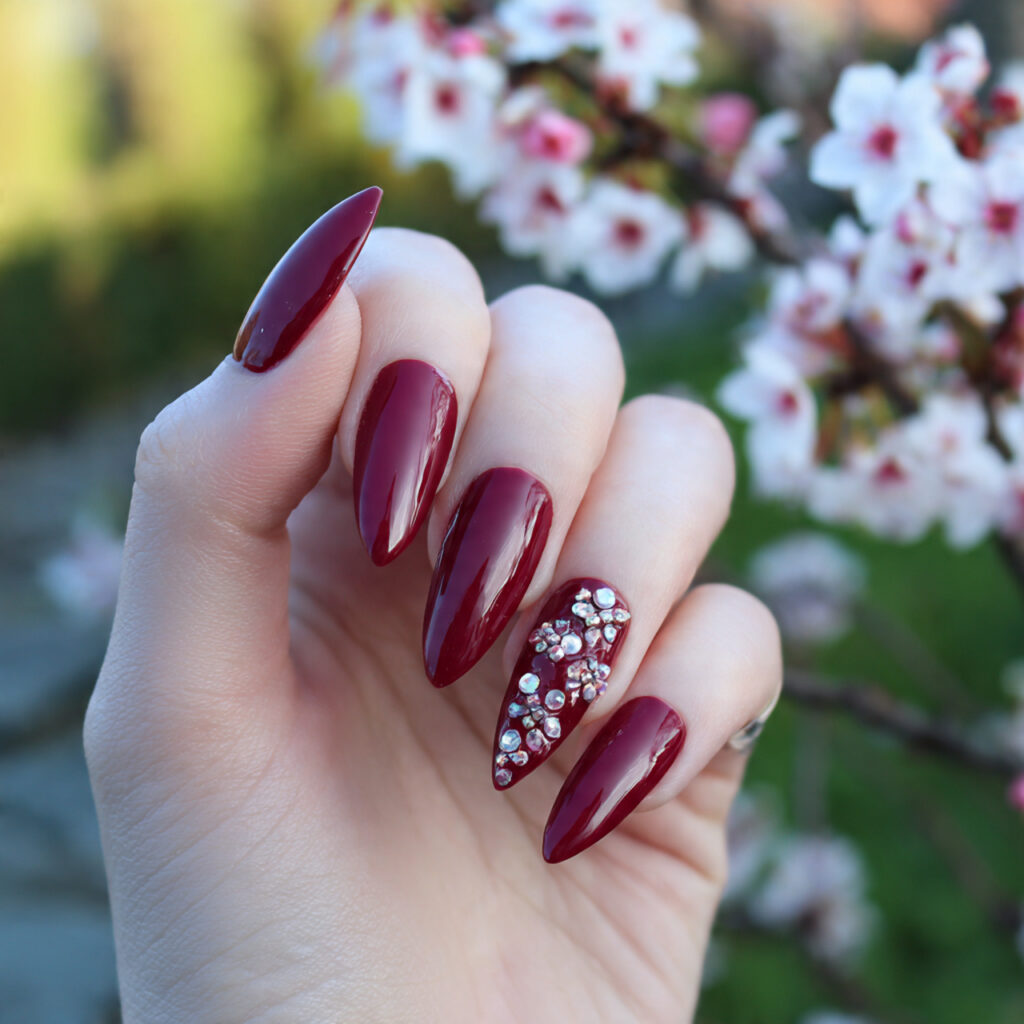 attractive burgundy stiletto drama nails with summ