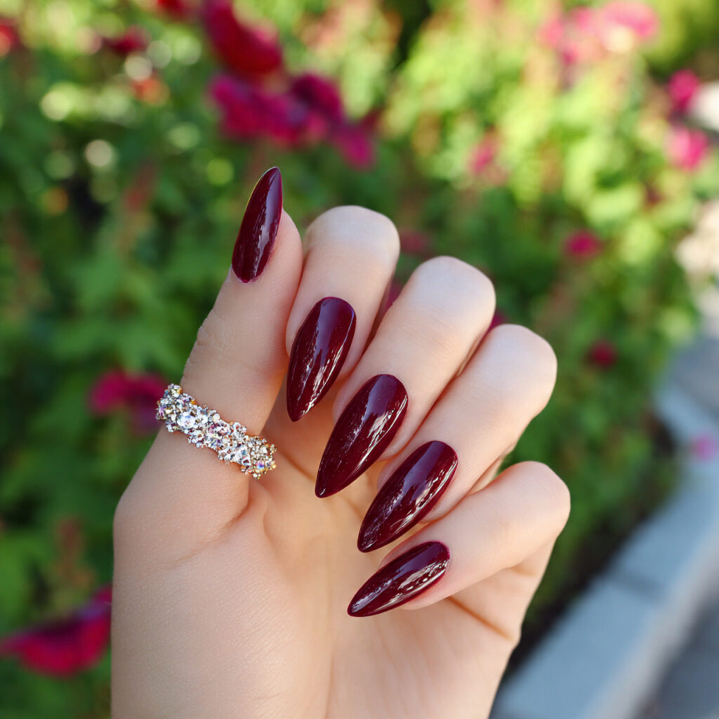 attractive burgundy stiletto prom drama nails with