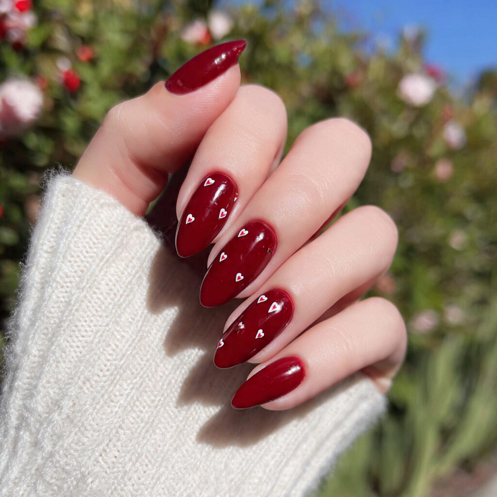 Red Nails Aesthetic: 14 Soft, Trendy & Pinterest-Perfect Ideas You’ll Want to Save 4 attractive cherry red with tiny heart accent nails 1