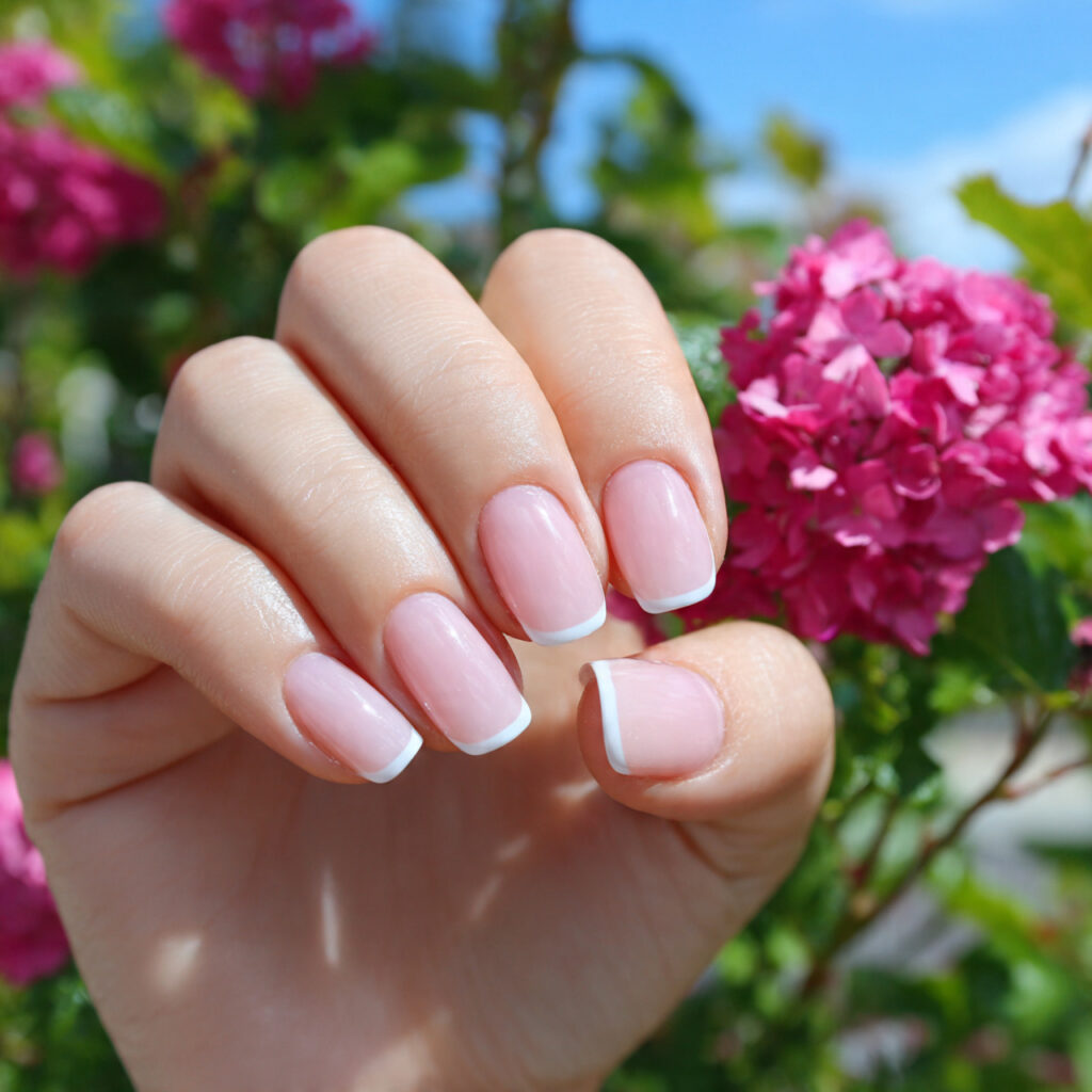 attractive classic baby pink french nails with out