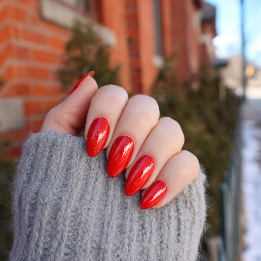 attractive classic bright red cat eye almond nails