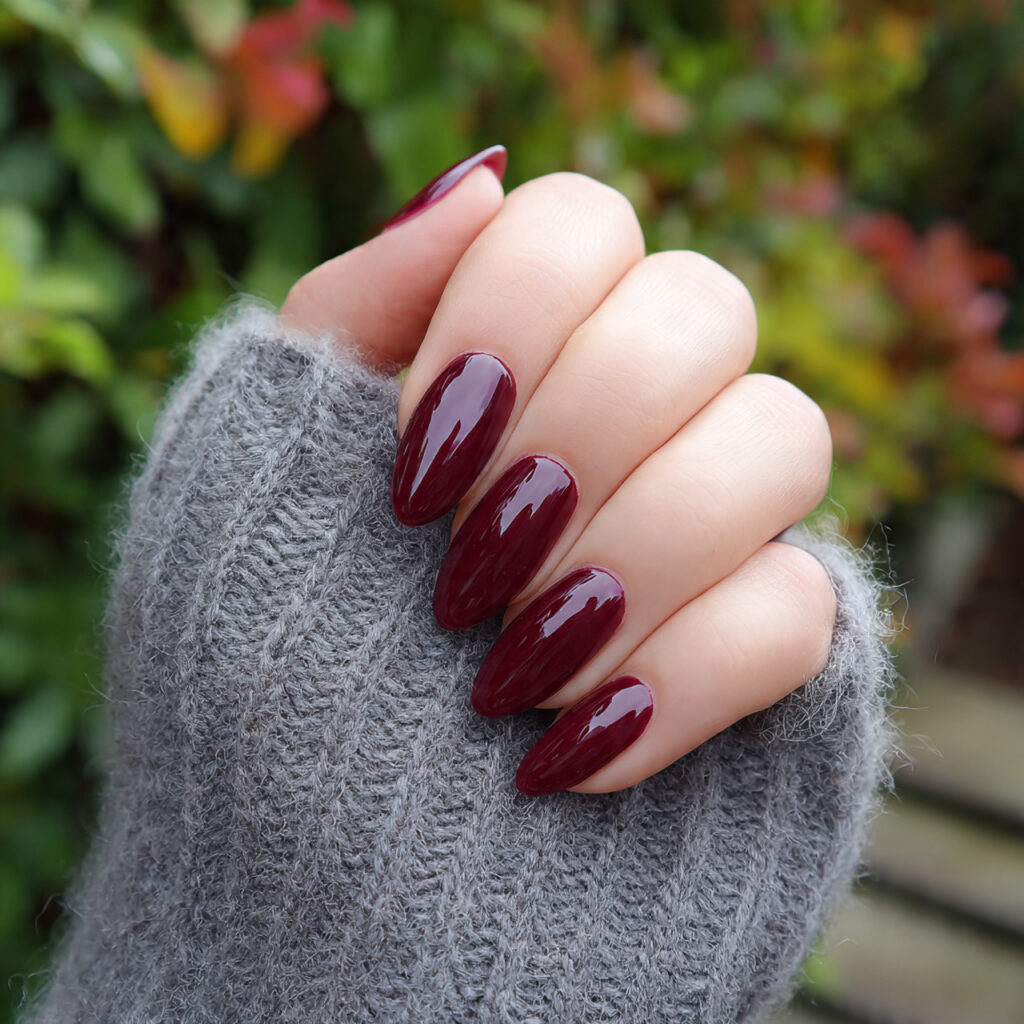 attractive deep ruby almond gloss nails with outdo 1