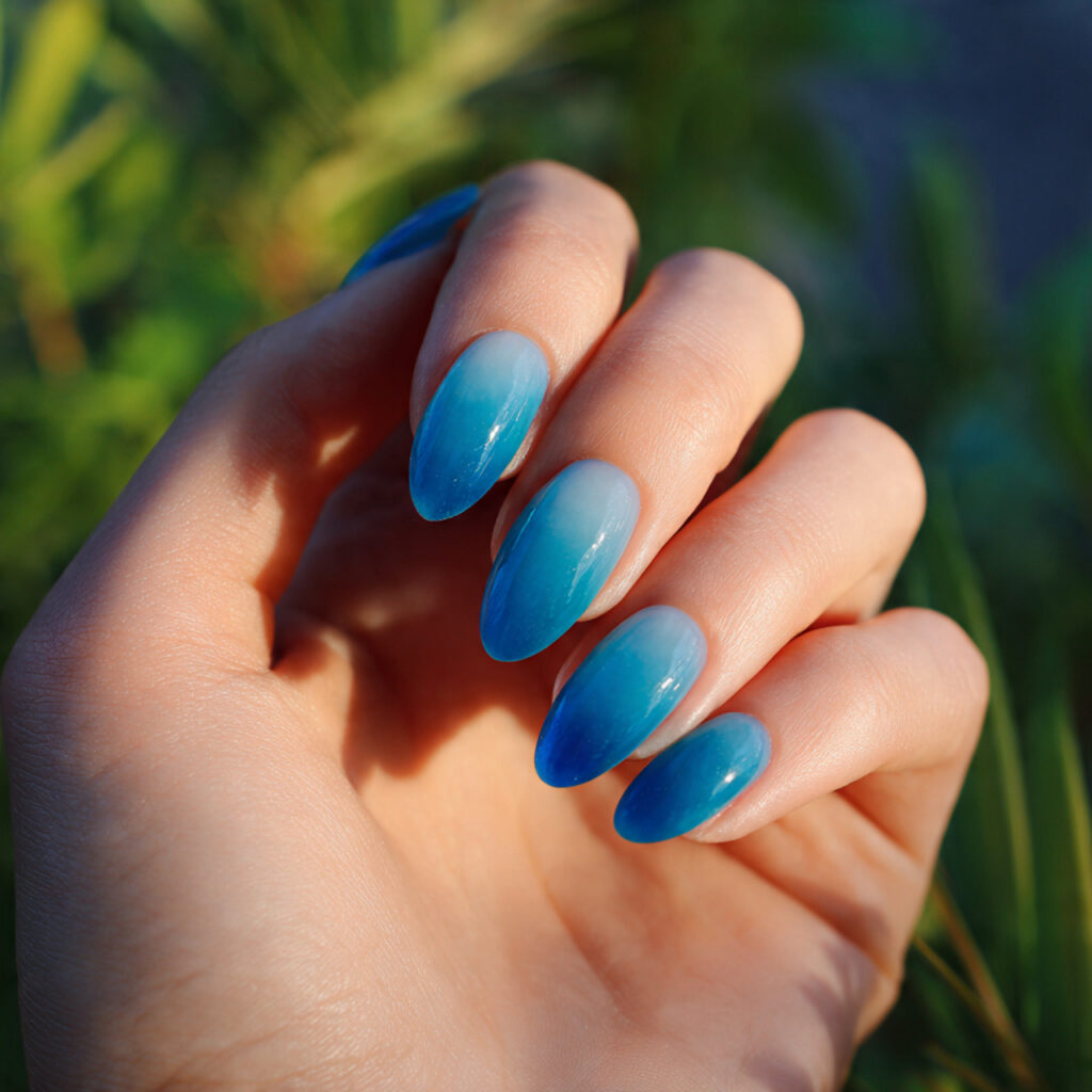 attractive fog blue jelly nails with outdoor backg