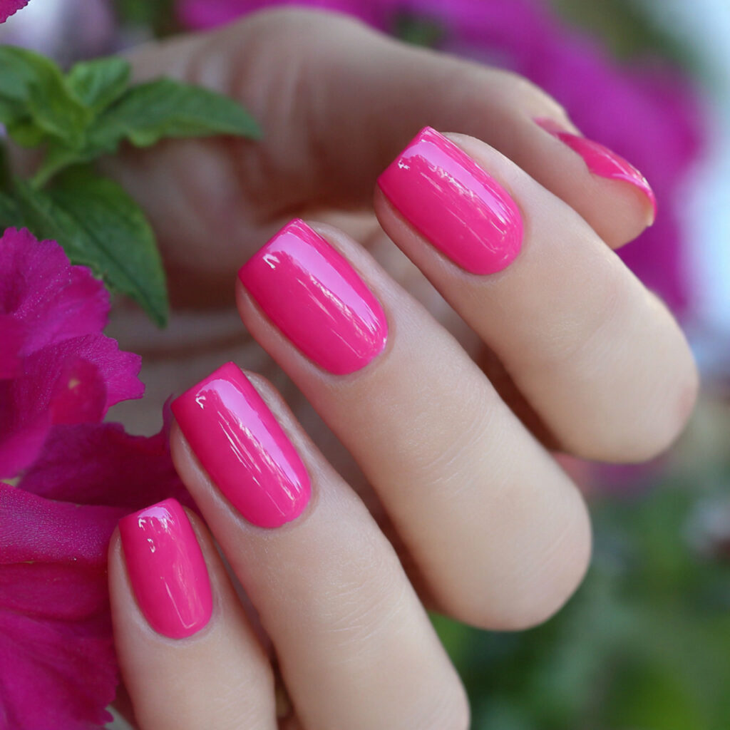 attractive glazed hot pink nails with outdoor summ