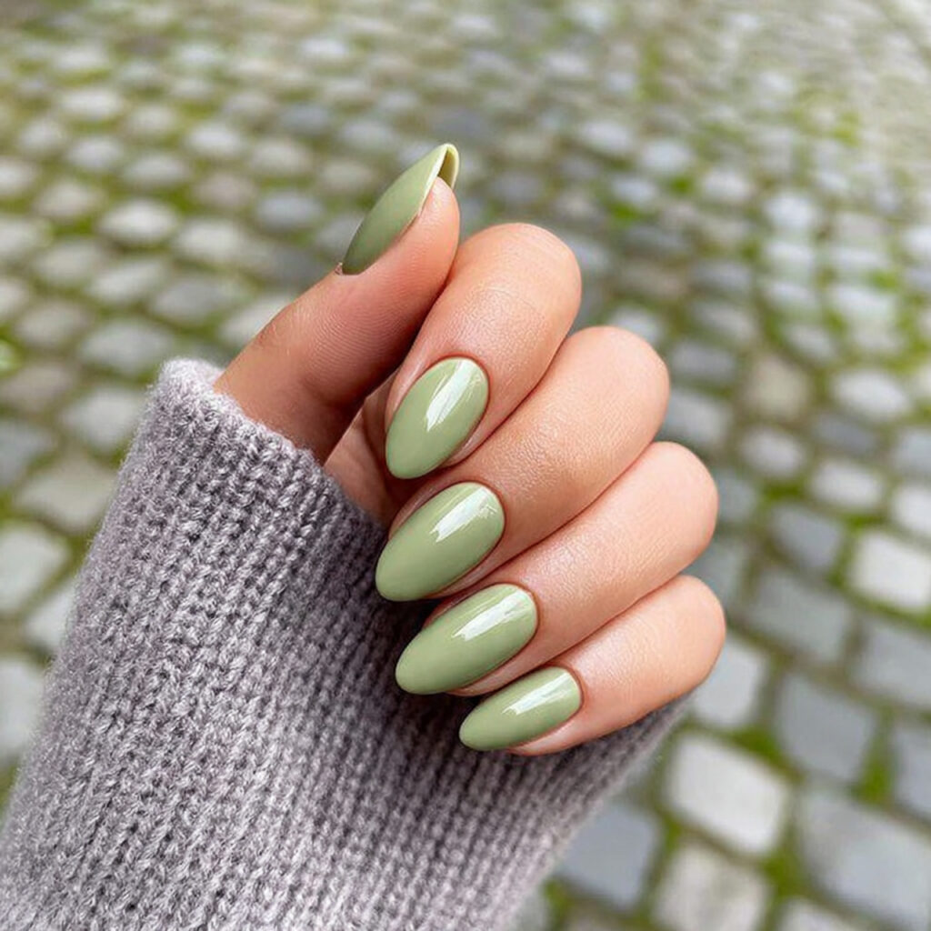attractive glossy sage green almond nails with out