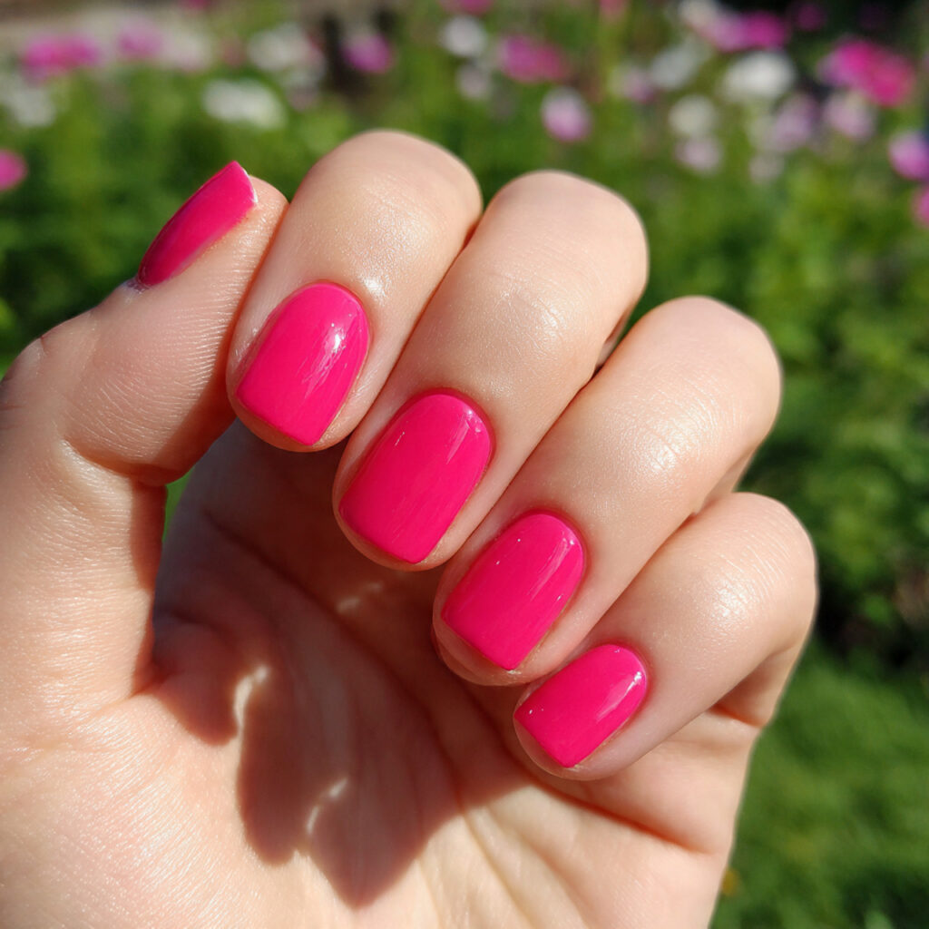 attractive hot pink short nails with outdoor summe 1