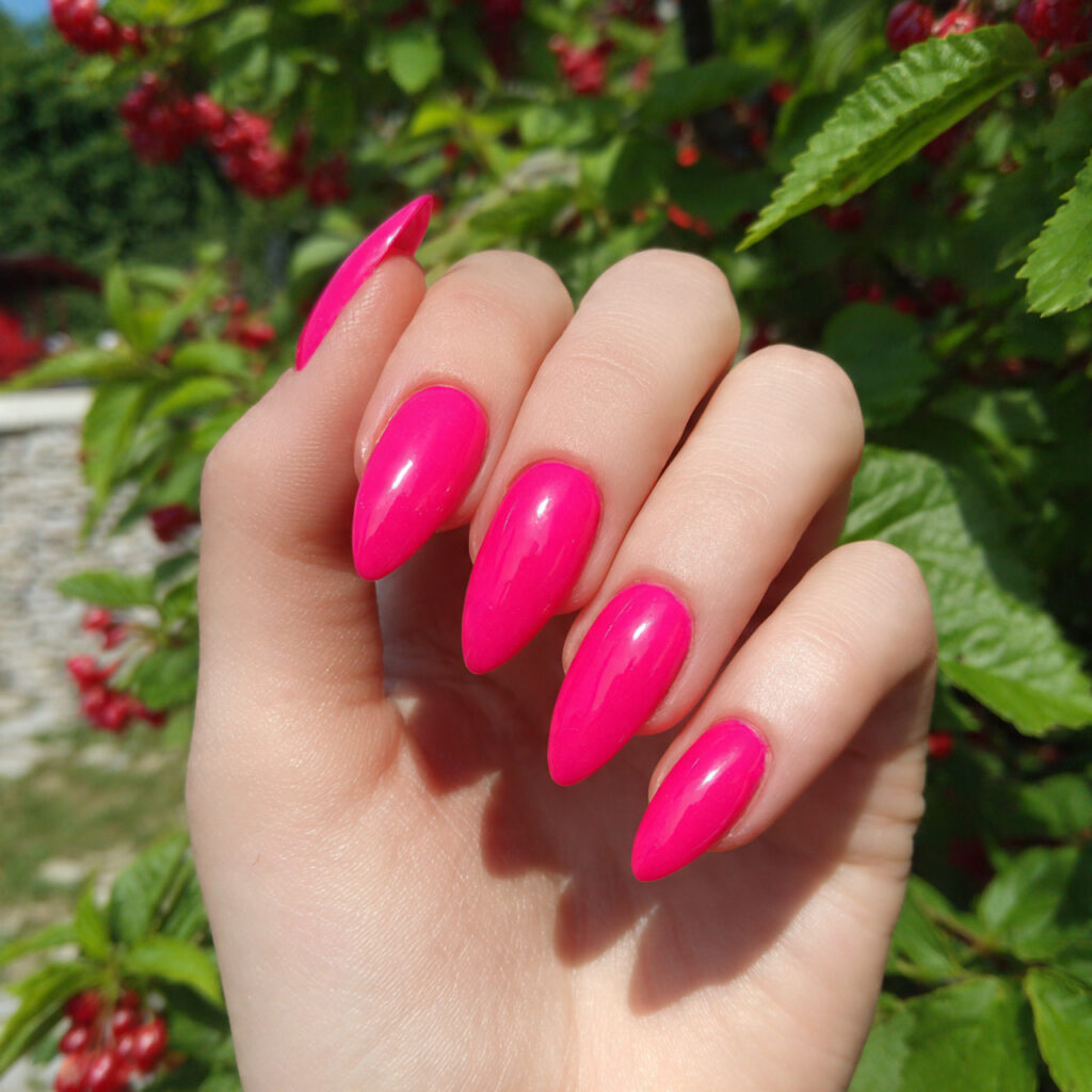 attractive hot pink stiletto nails with outdoor su