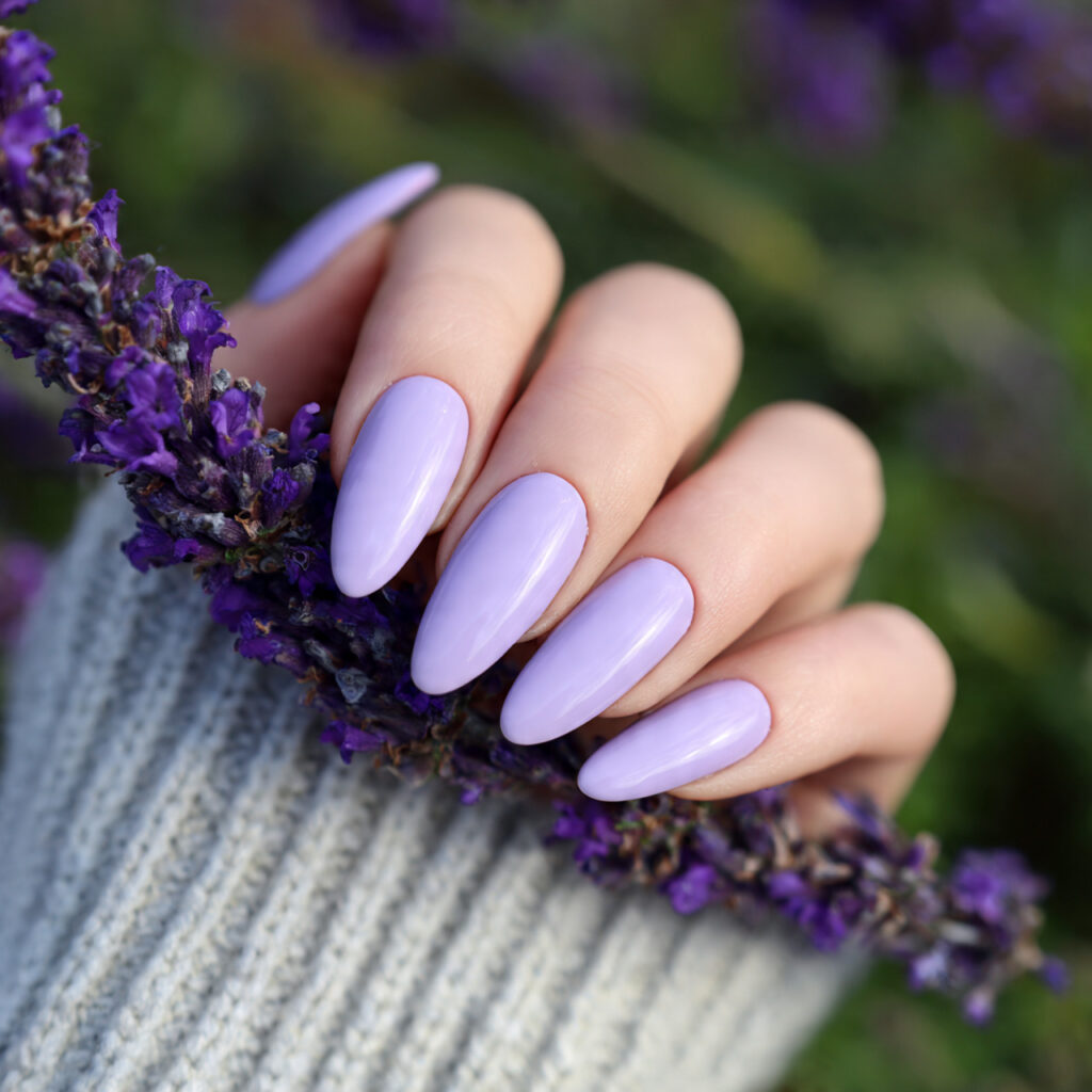 attractive lavender cream almond nails with outdoo