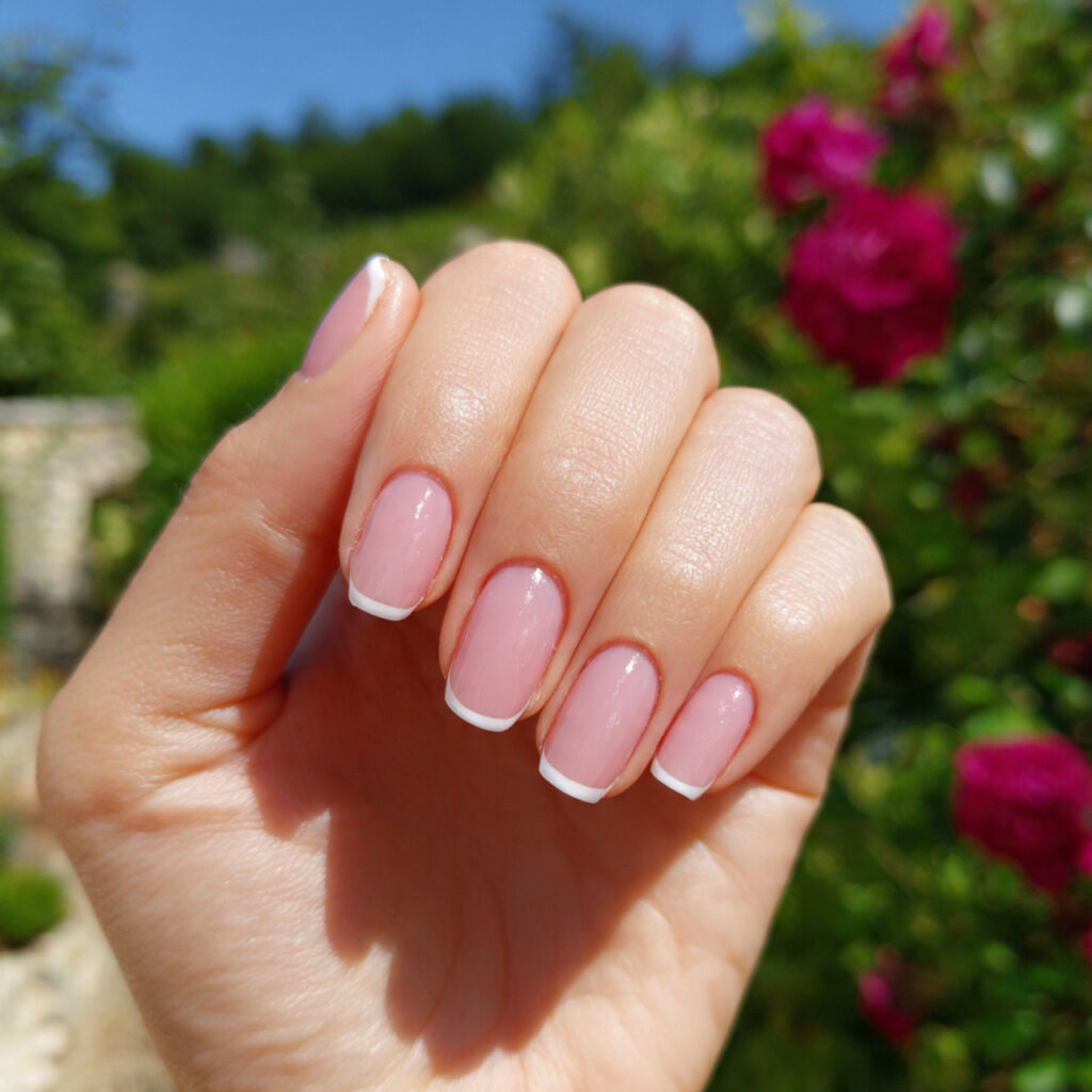 attractive light pink micro french nails with outd