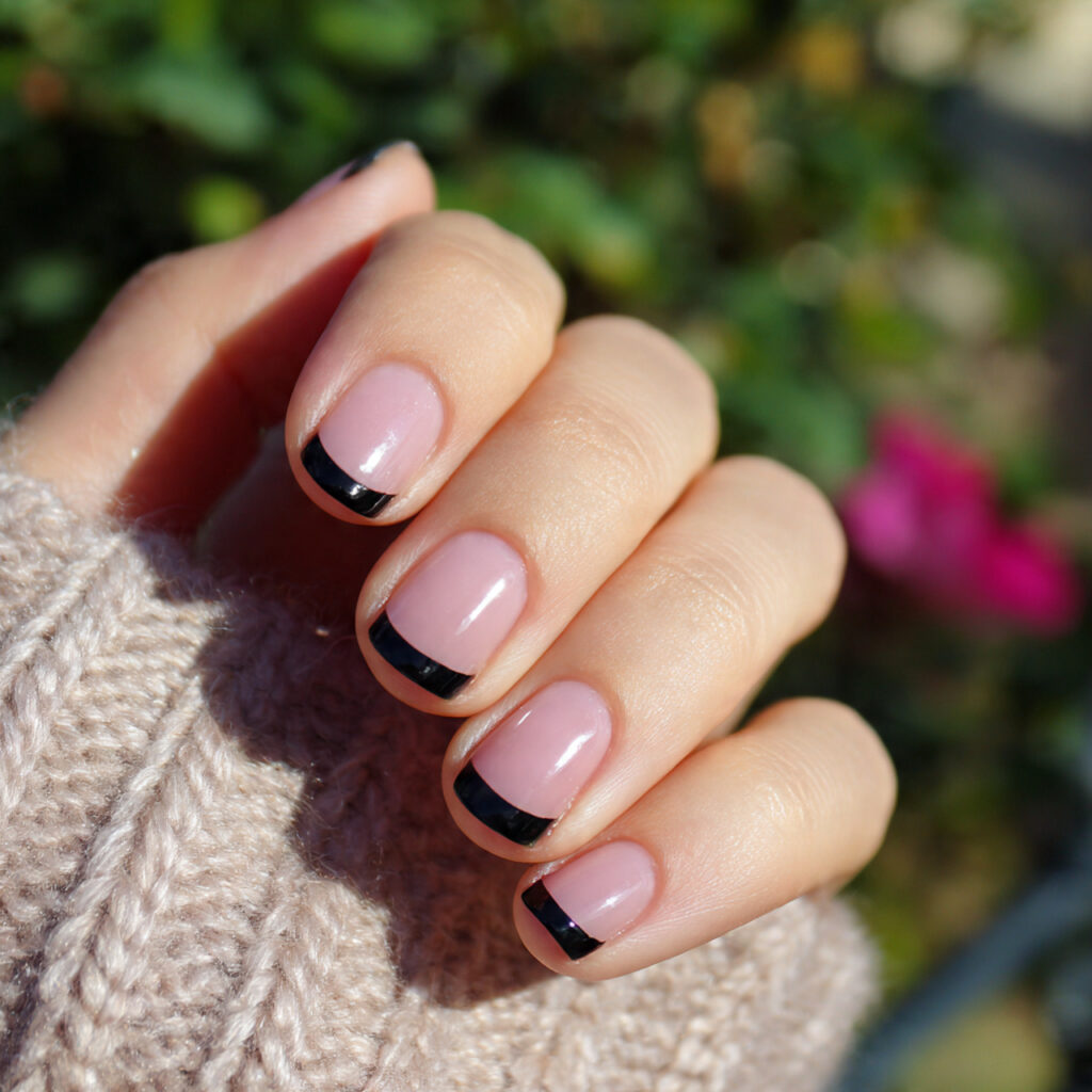 attractive minimal black french tips on short nail