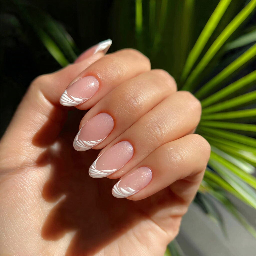 attractive minimal white swirl tips on base nails