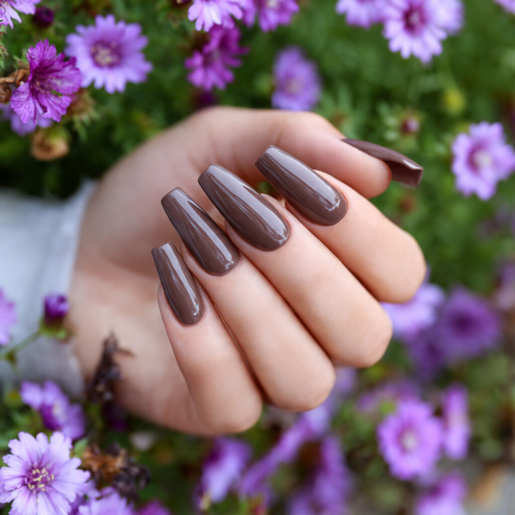 attractive mocha brown coffin acrylic nails with o
