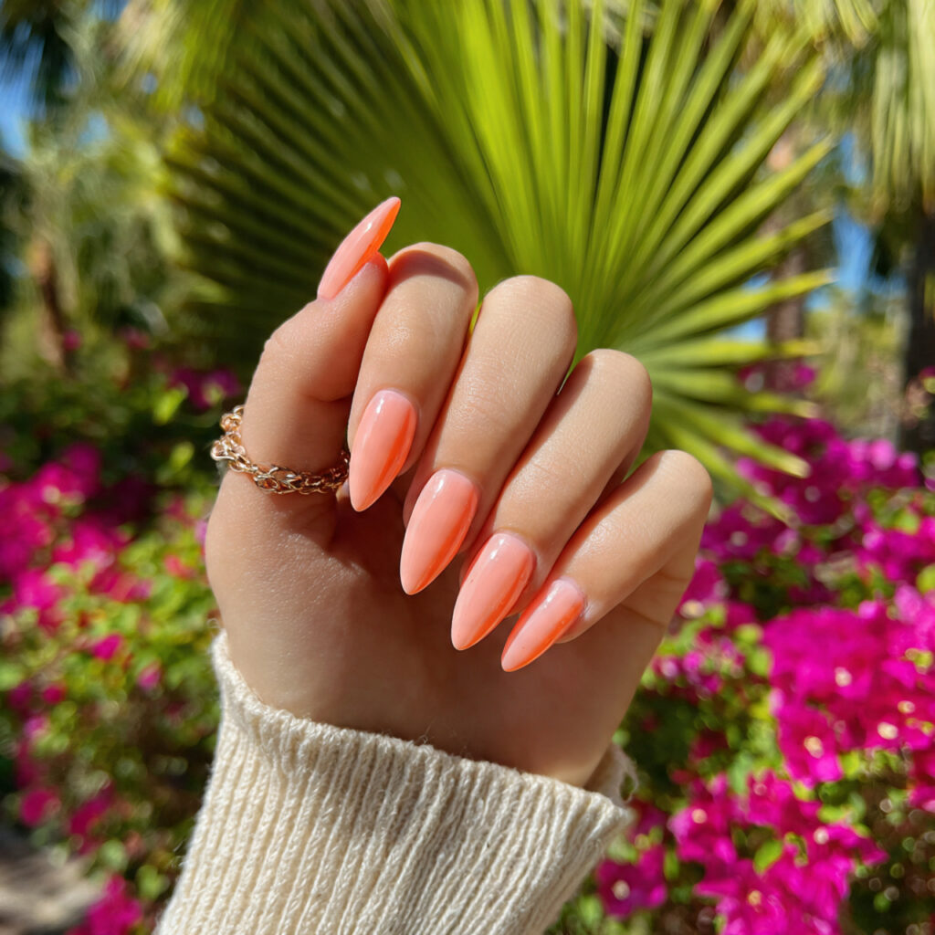 attractive peach sorbet short stiletto nails with