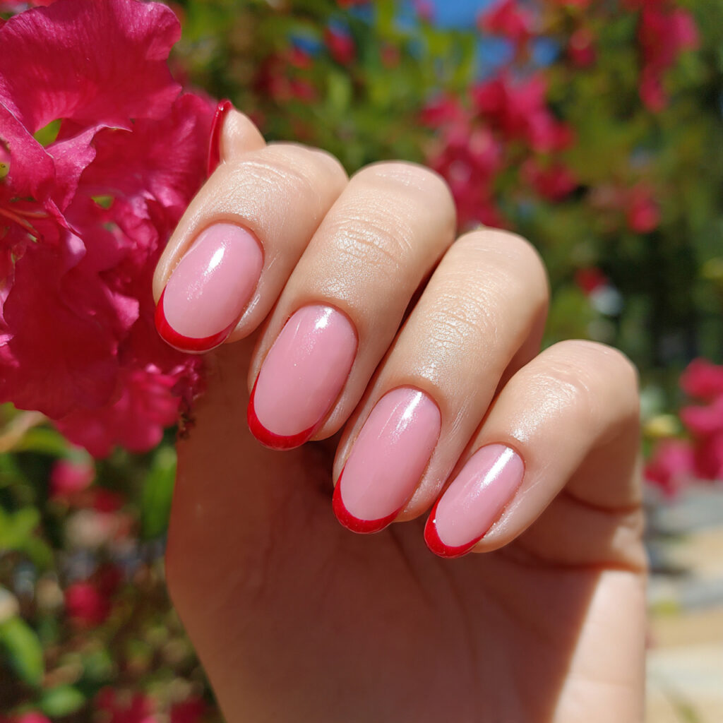attractive pink and red french tip nails with outd