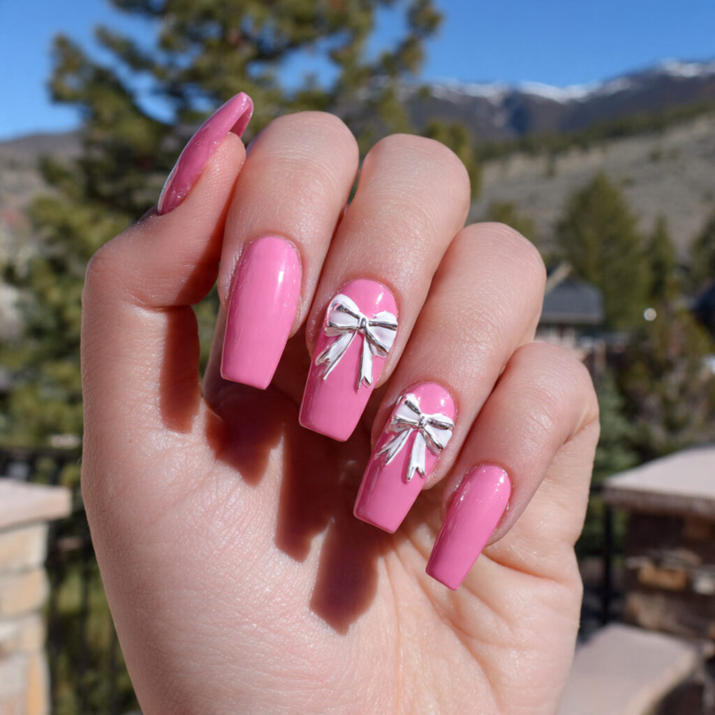 attractive pink bow nails with outdoor background