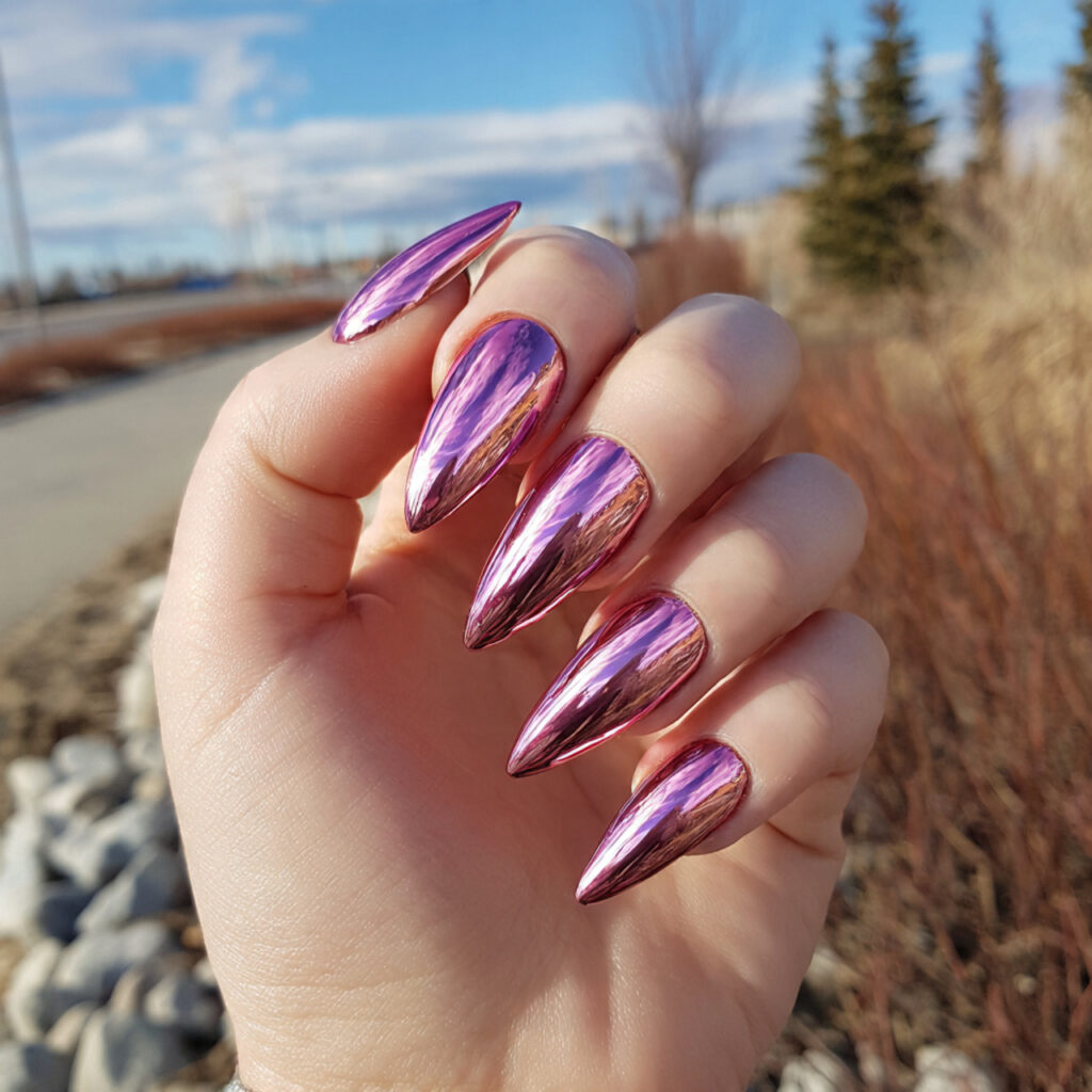 attractive pink chrome stiletto nails with outdoor