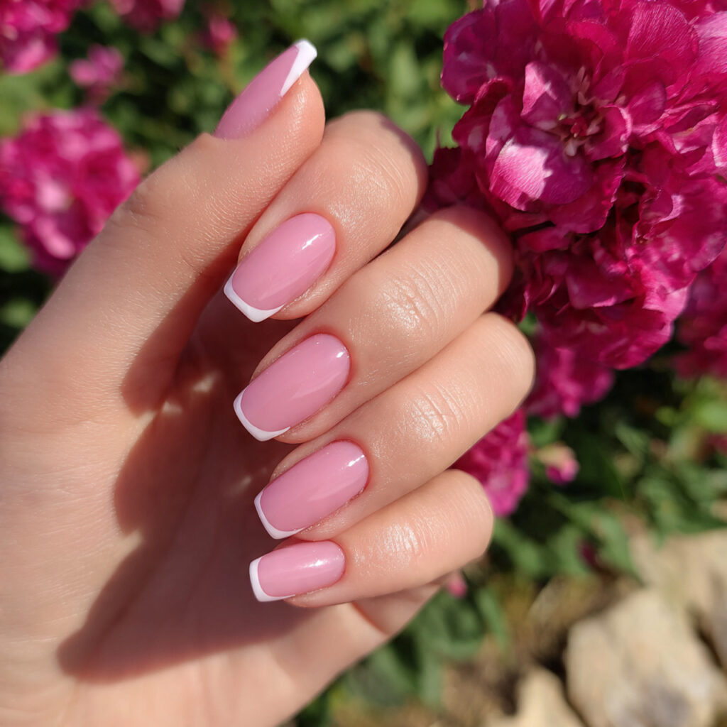 attractive pink french acrylic nails with outdoor