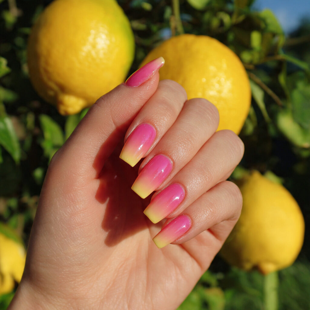attractive pink lemonade ombr nails with outdoor b
