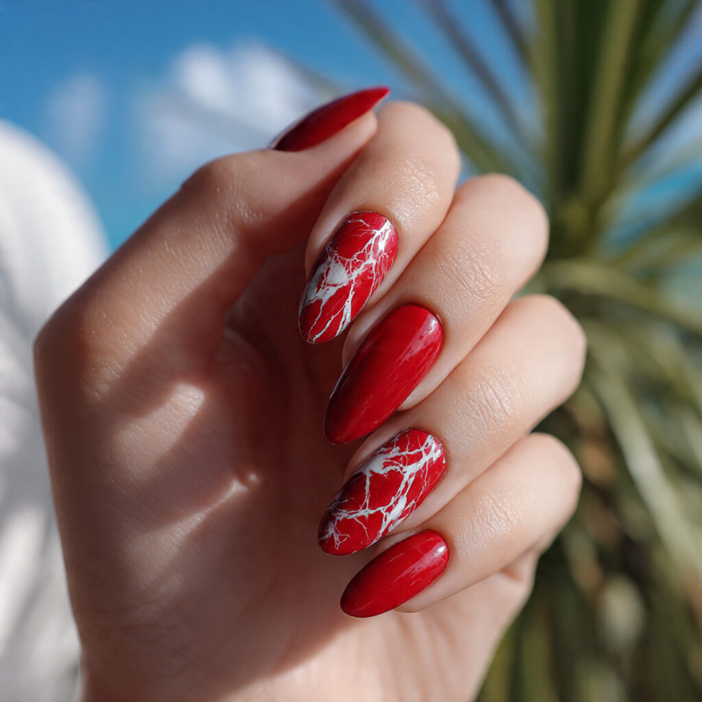 attractive red acrylic with marble veining nails w