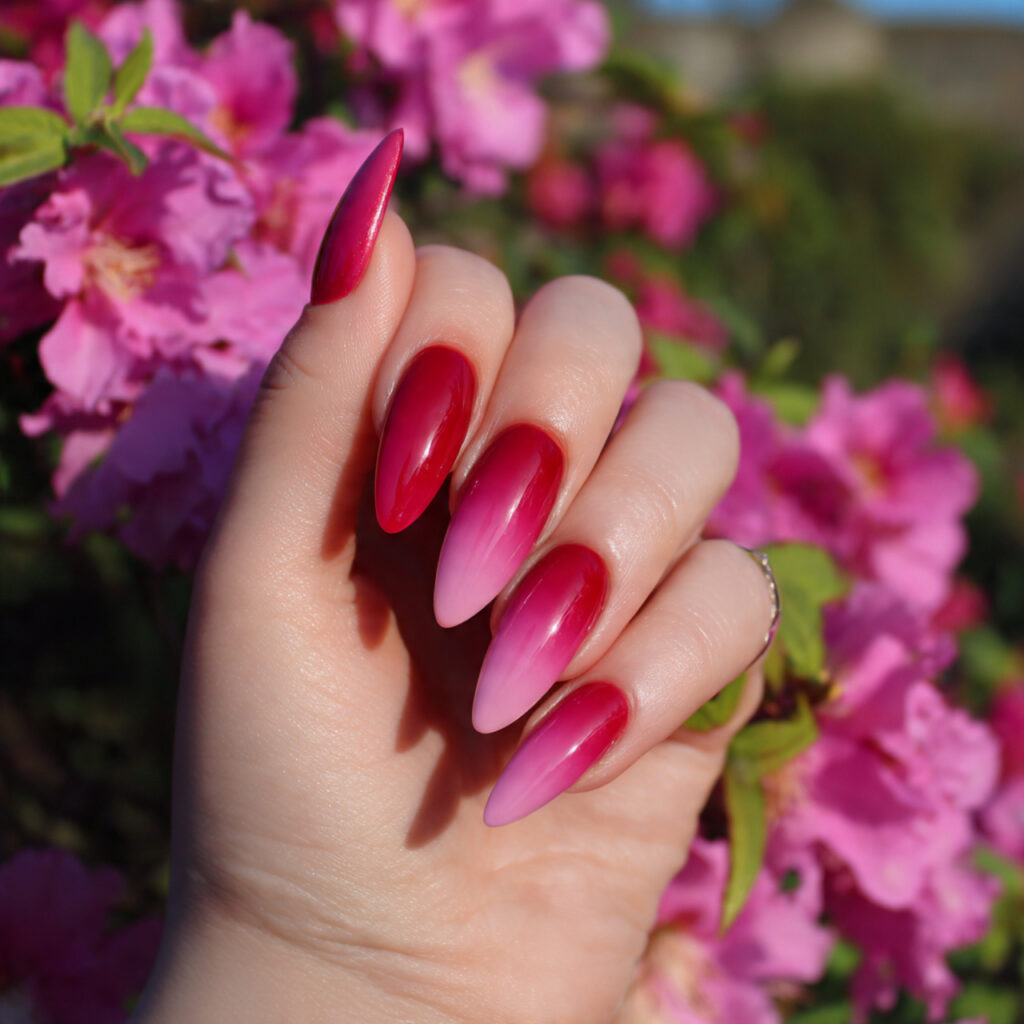 attractive red and pink ombre stiletto nails with