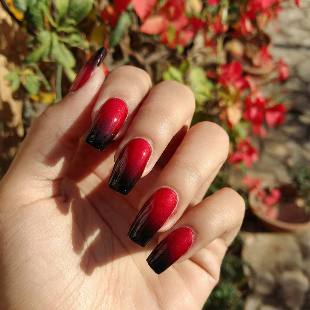 attractive red ombre into black tips nails with ou