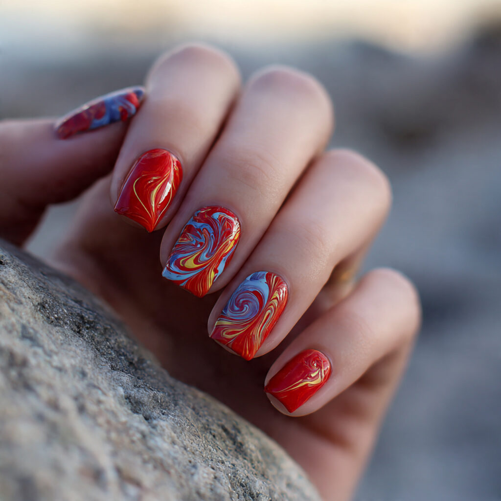 attractive red swirl art on nude base nails with o