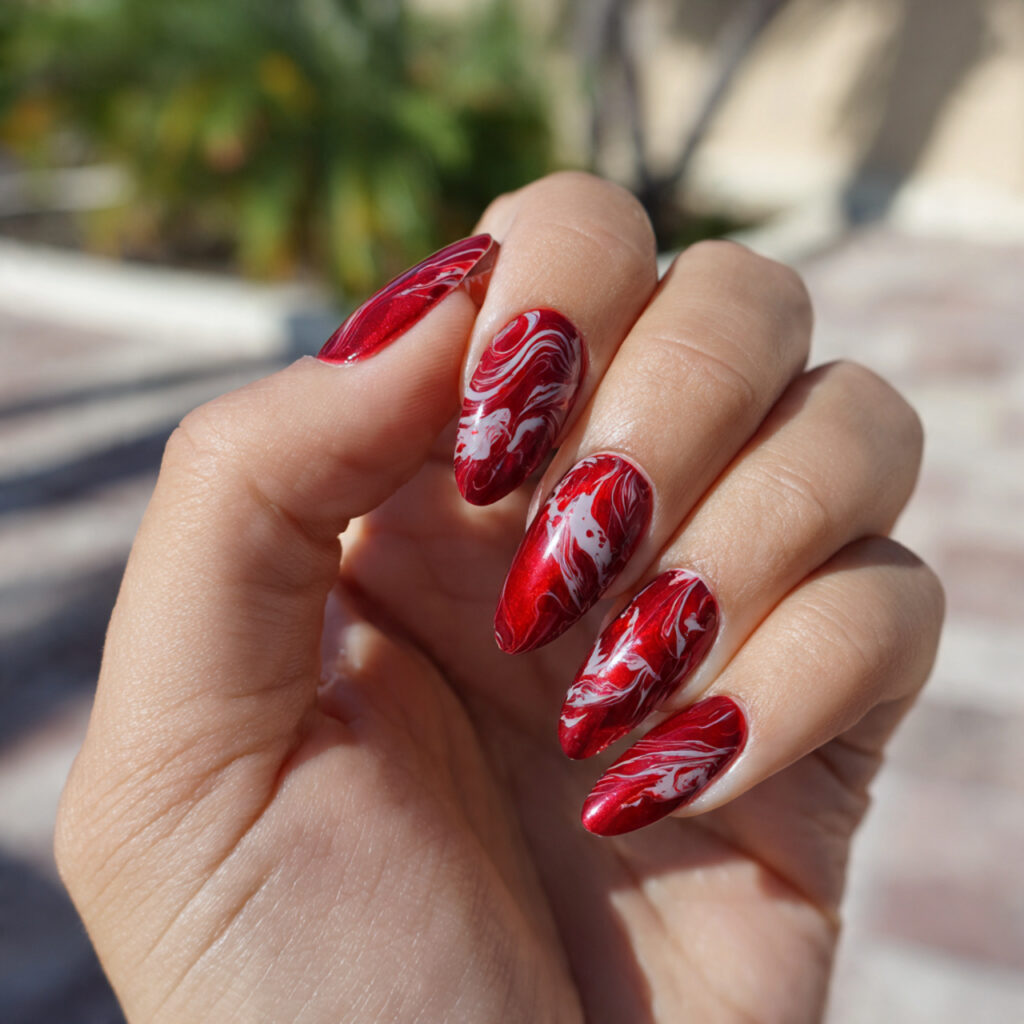 attractive red swirls on milky base nails with out