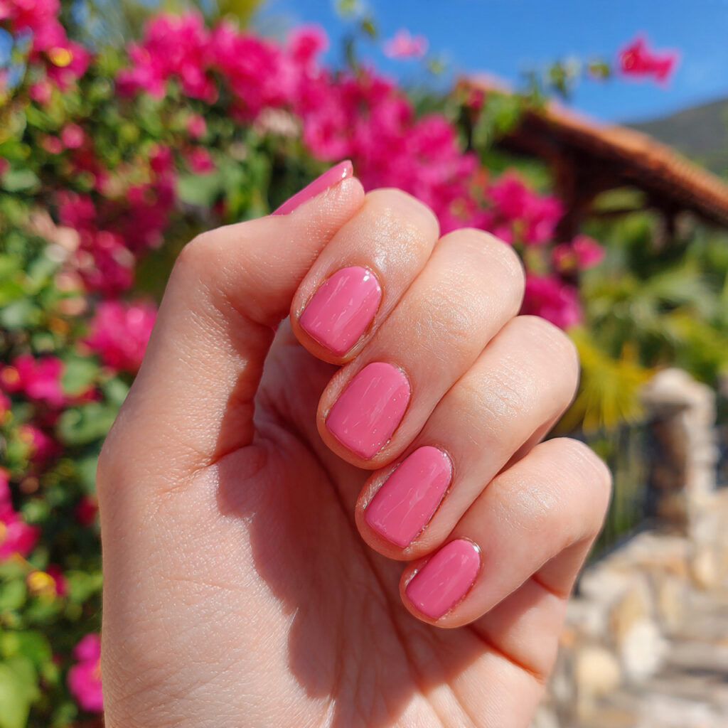 attractive rosy nude pink short nails with outdoor
