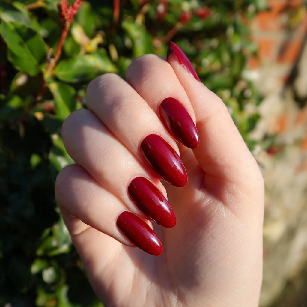 attractive ruby red almond acrylic nails with summ