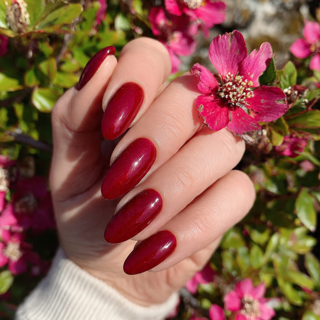 attractive ruby red gel almond elegance nails with