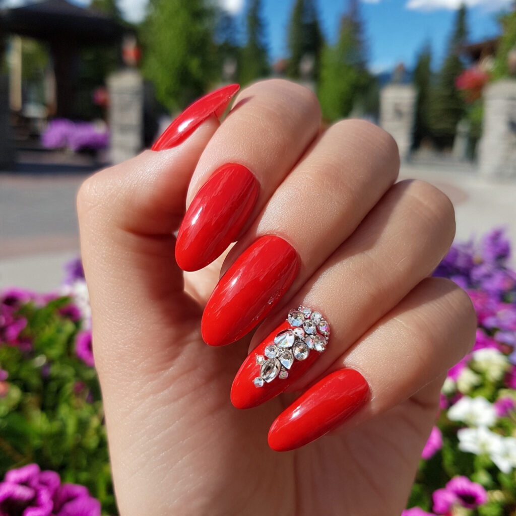 attractive scarlet gel with rhinestone accent nail