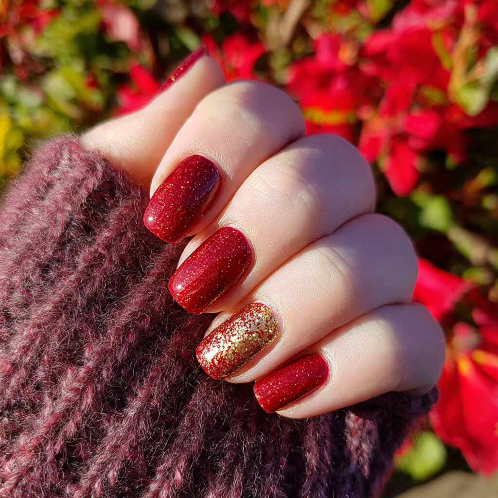 attractive scarlet glitter with gold accent nails