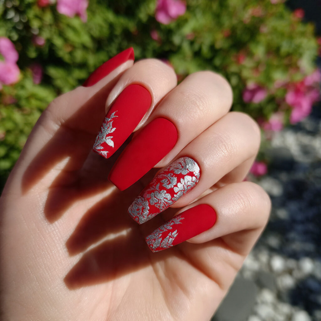attractive scarlet red prom nails with silver deta 1