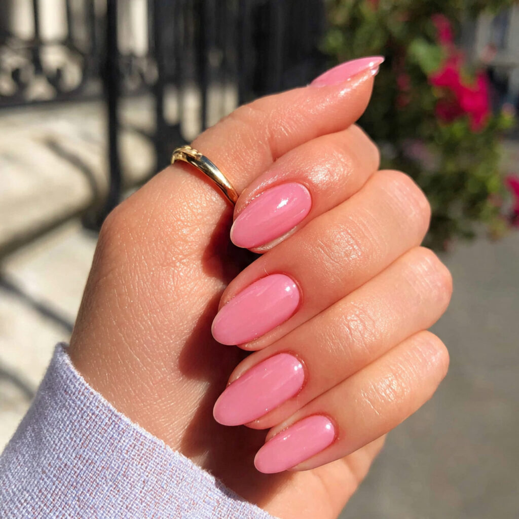 attractive sheer baby pink oval nails with outdoor