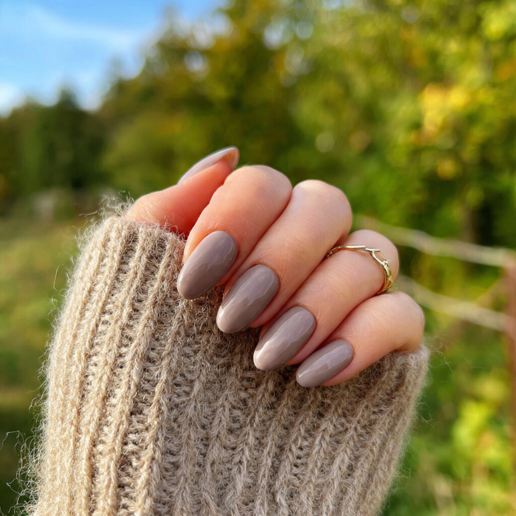 attractive soft taupe monochrome nails with outdoo