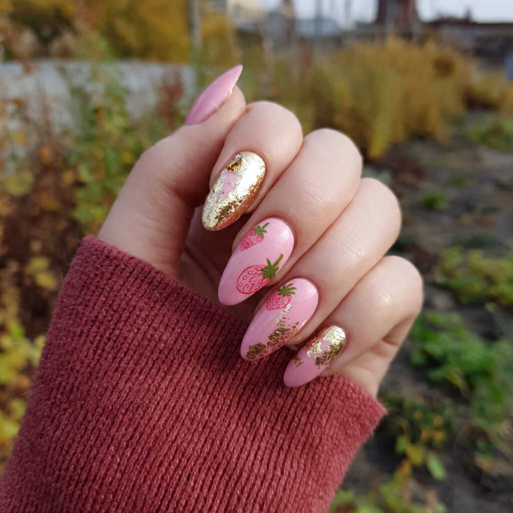 attractive strawberry milk and gold foil nails wit